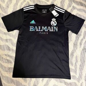 Adidas Black Real Madrid Collaboration Balmain jersey kit.